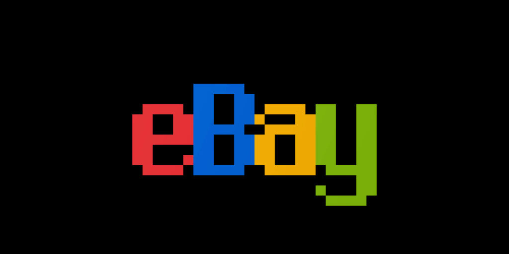 Pixel art eBay logo wallpaper with vibrant red blue yellow green letters on black background