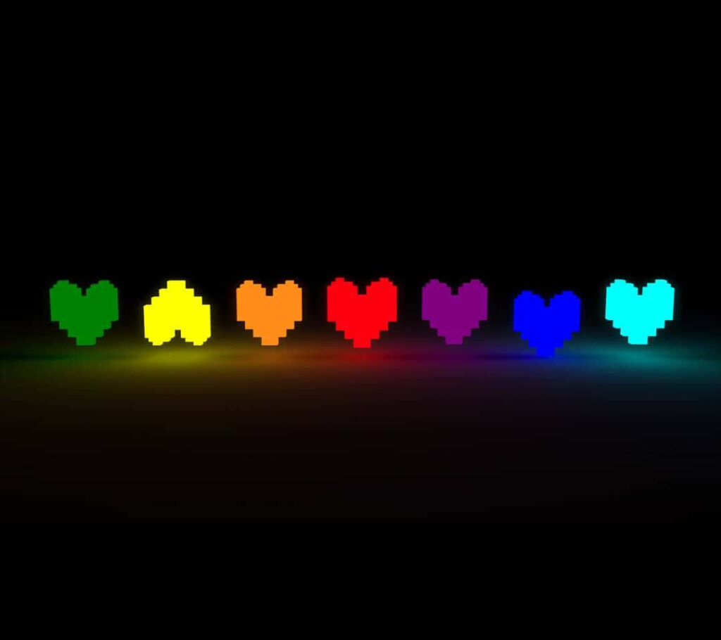 Vibrant Rainbow Hearts Wallpaper: Love & Unity on Dark Background