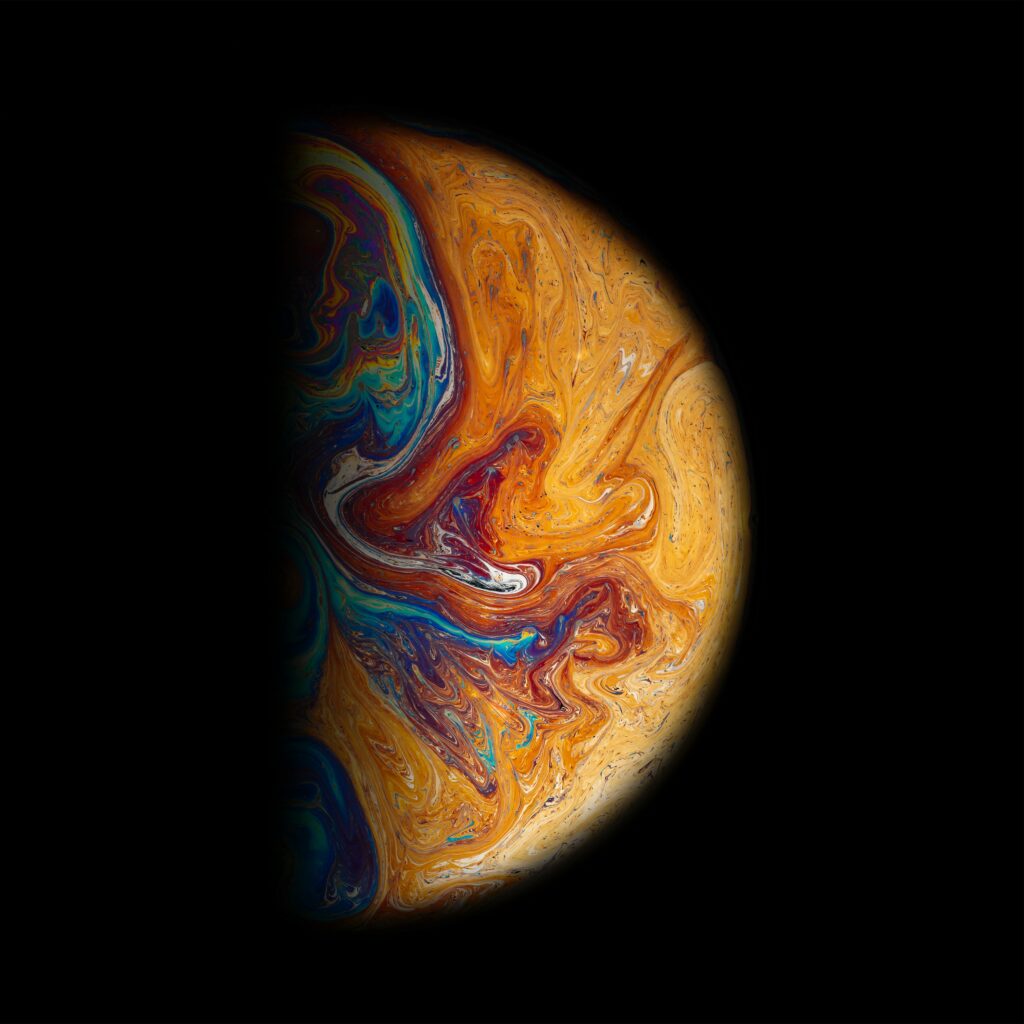 Vibrant Half-Sphere Wallpaper: Colorful Patterns on Black Background