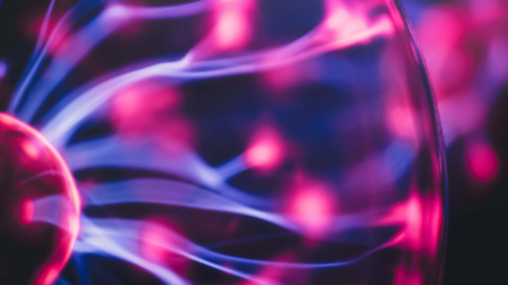 Vibrant Plasma Wallpaper: Colorful Energetic Beams Background