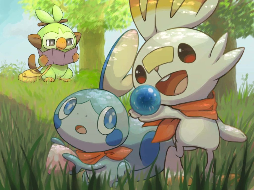 Vibrant Pokémon wallpaper featuring Grookey Sobble Raboot in a sunny lush forest background