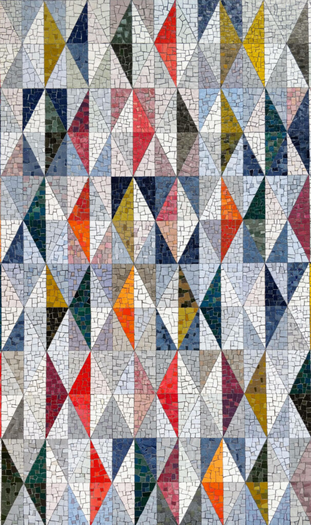 Vibrant pop art wallpaper with colorful geometric tiles in dynamic triangular mosaic pattern