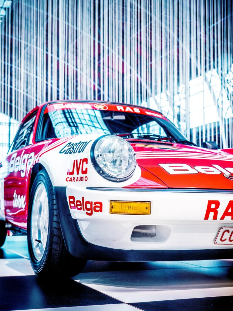 Vibrant Porsche Sports Car Wallpaper: Speed, Decals & Competition