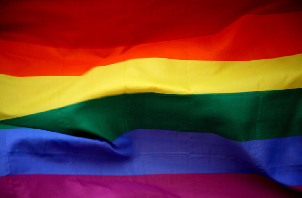 Pride of Colors: A Breathtaking Gay Rainbow Flag Wallpaper