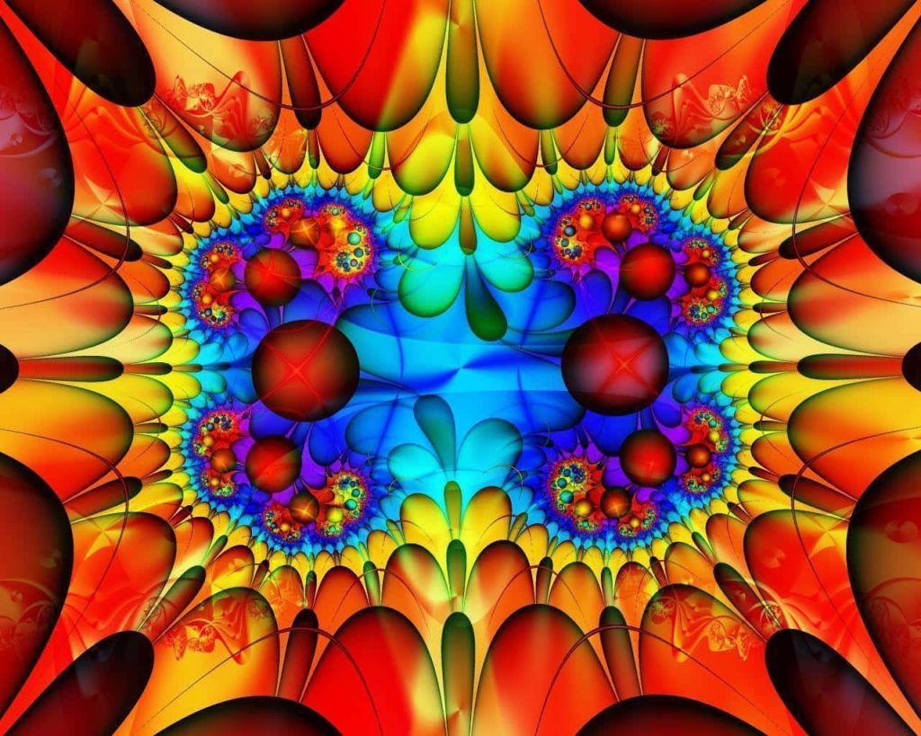 Psychedelic digital fractal wallpaper with vibrant floral patterns and colorful floating spheres