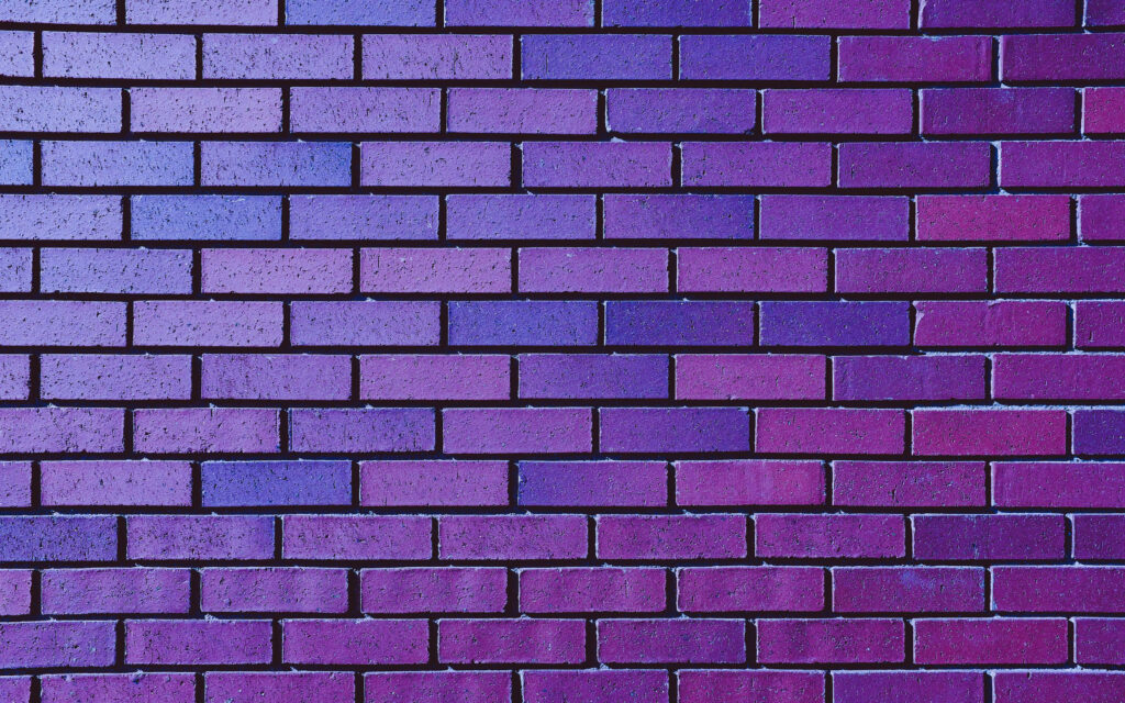 Vibrant Purple Brick Texture Wallpaper Background - Bold & Dynamic Design