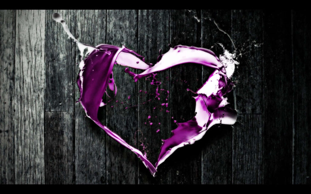Vibrant Purple Heart Splash Wallpaper on Textured Wood Background