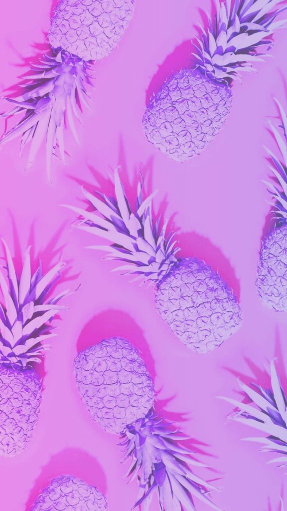 Vibrant wallpaper with light purple pineapples on bright magenta background tropical pop art design