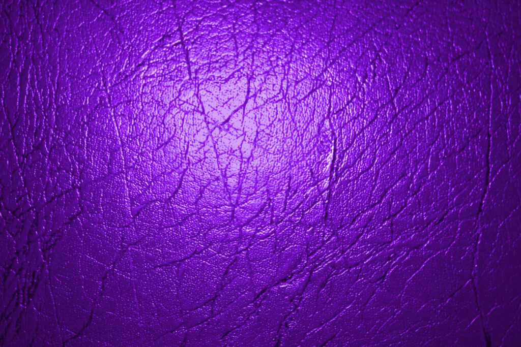 Vibrant Purple Textured Wallpaper with Intricate Crack Patterns