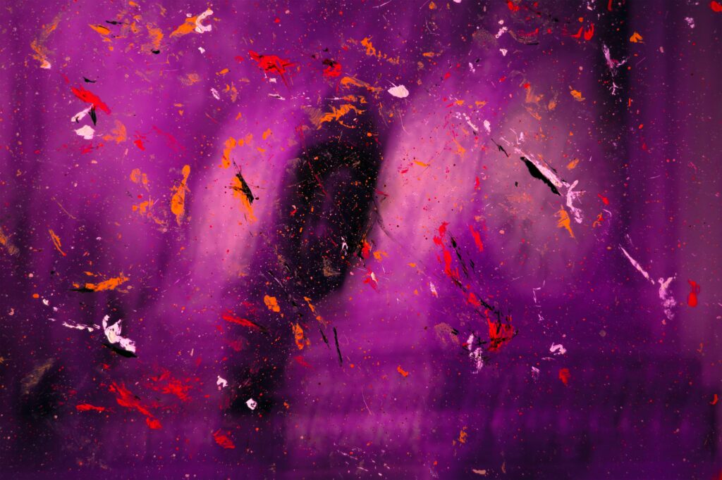 Vibrant Purple Abstract Wallpaper with Colorful Paint Stains