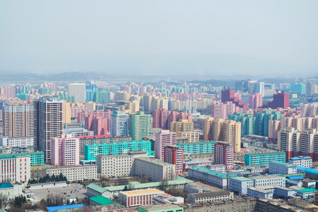Colorful Pyongyang Cityscape Wallpaper: Vibrant Urban Atmosphere