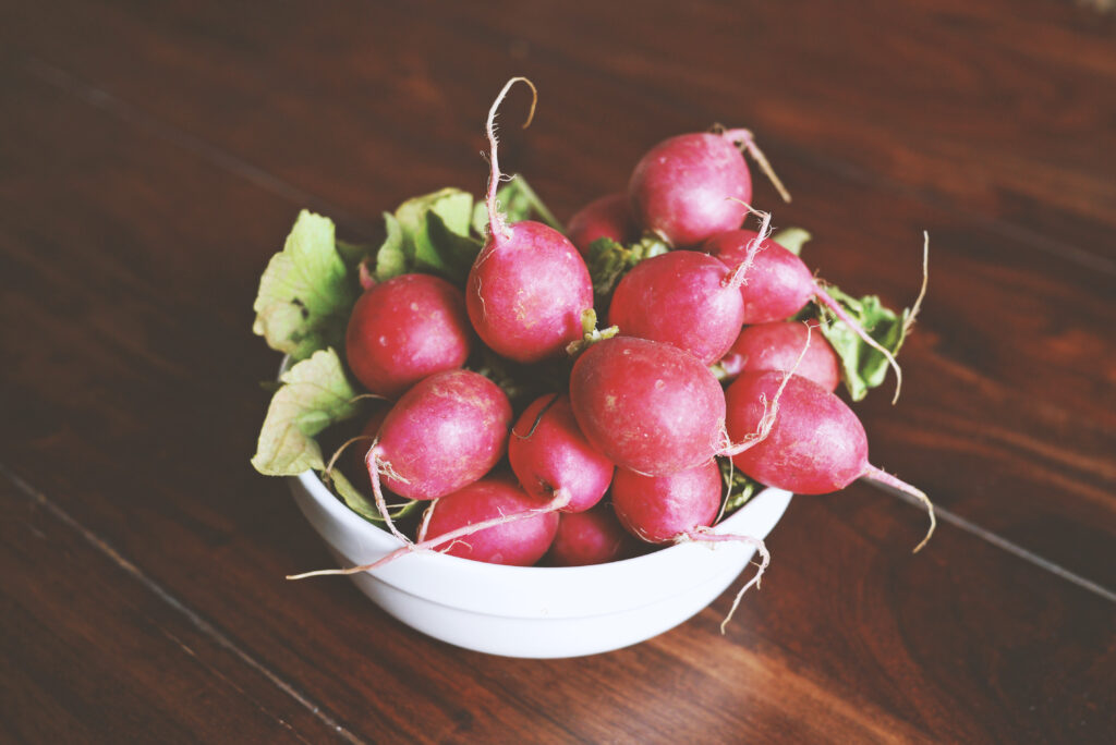 Vibrant Wallpaper of Radishes: Fresh, Textured & Nutritious Background