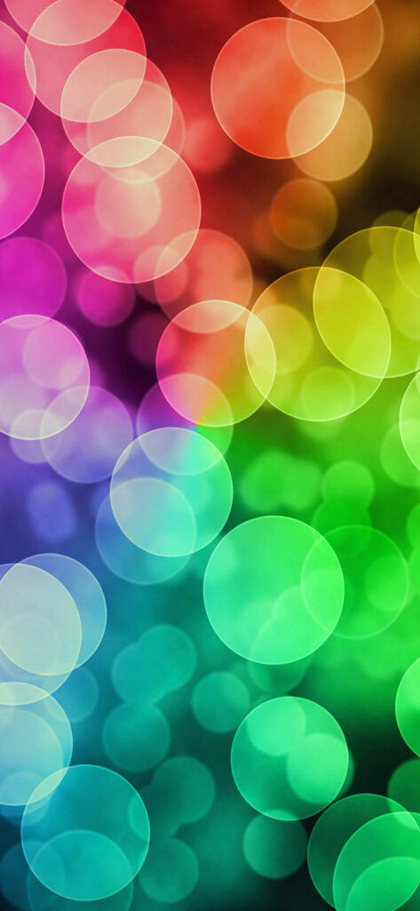 Dazzling Rainbow Bokeh Patterns: Vibrant iPhone 13 Pro Max Wallpaper