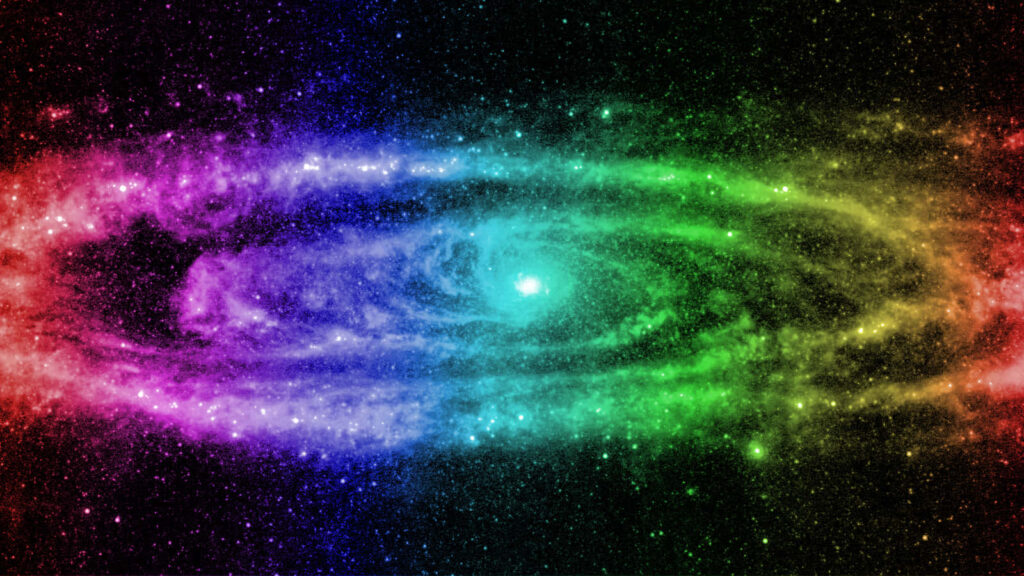 Vibrant galaxy wallpaper with rainbow hues and sparkling stars in cosmic expanse.