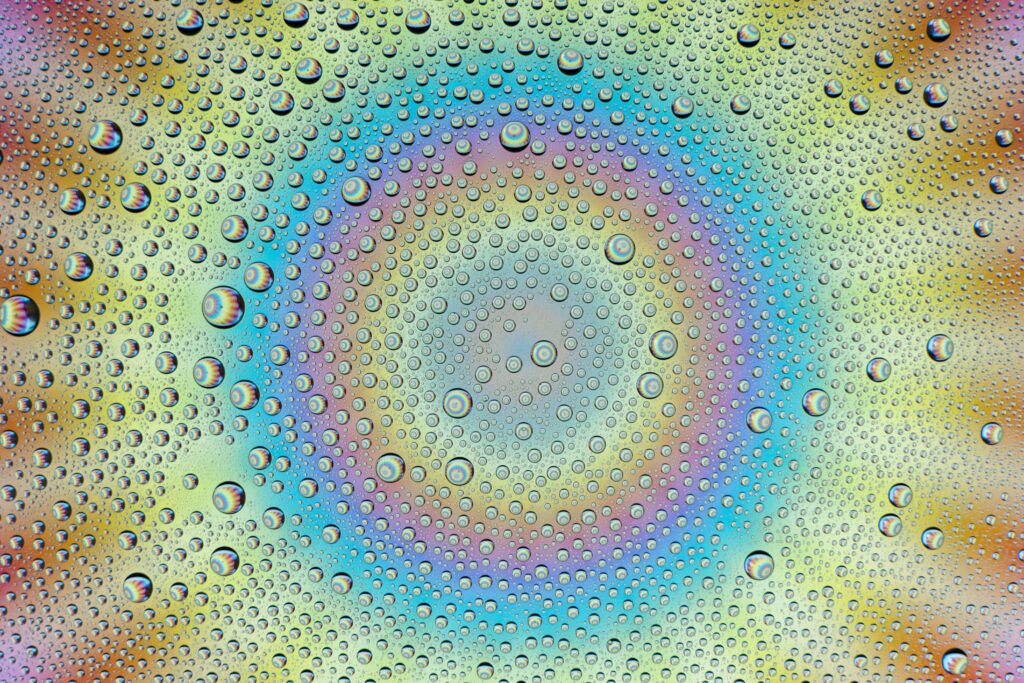 Vibrant Rainbow Gradient Wallpaper with Water Droplets - 6000x4000