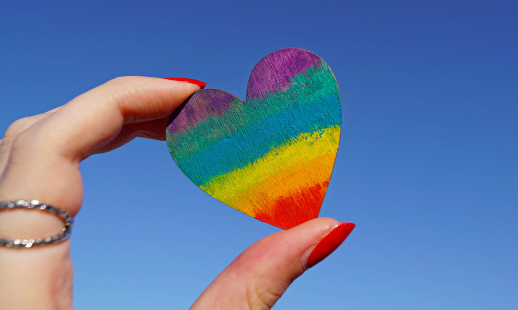 Vibrant Rainbow Heart Wallpaper for a Bright iPhone Background