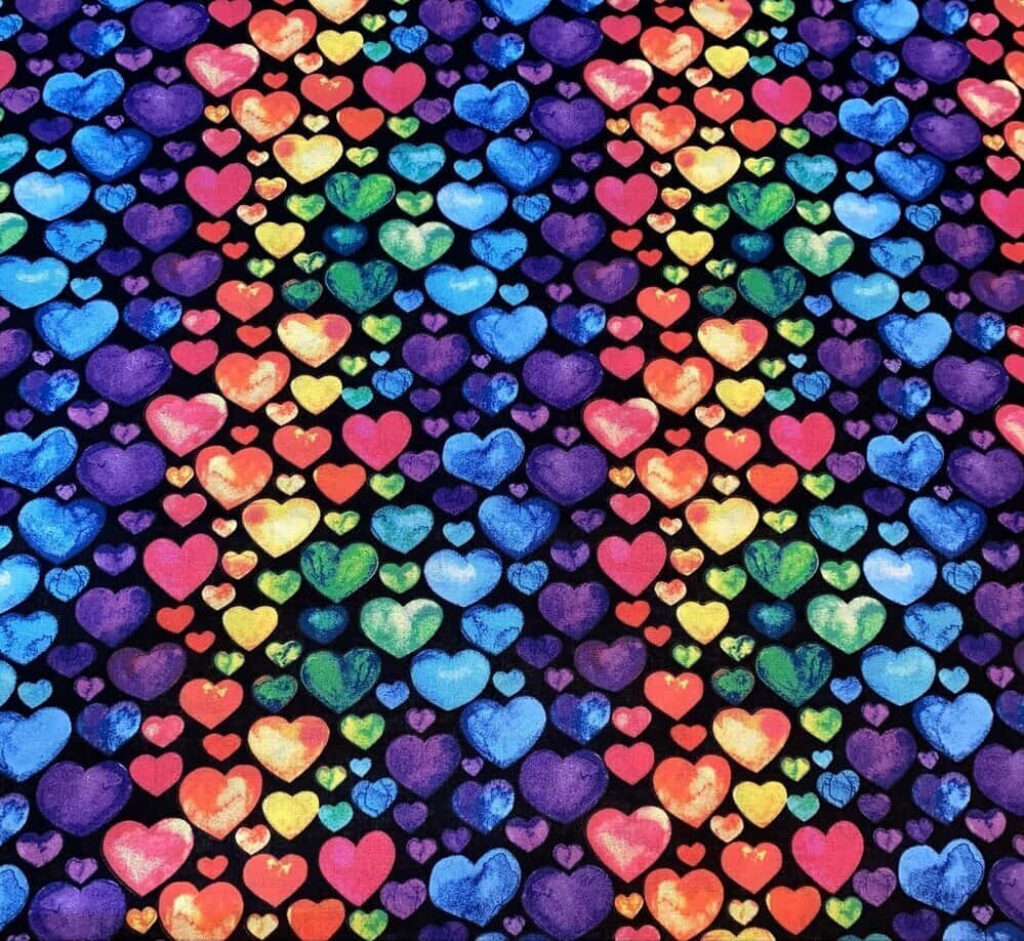 Vibrant Rainbow Hearts Wallpaper: Cheerful Dark Background Decor