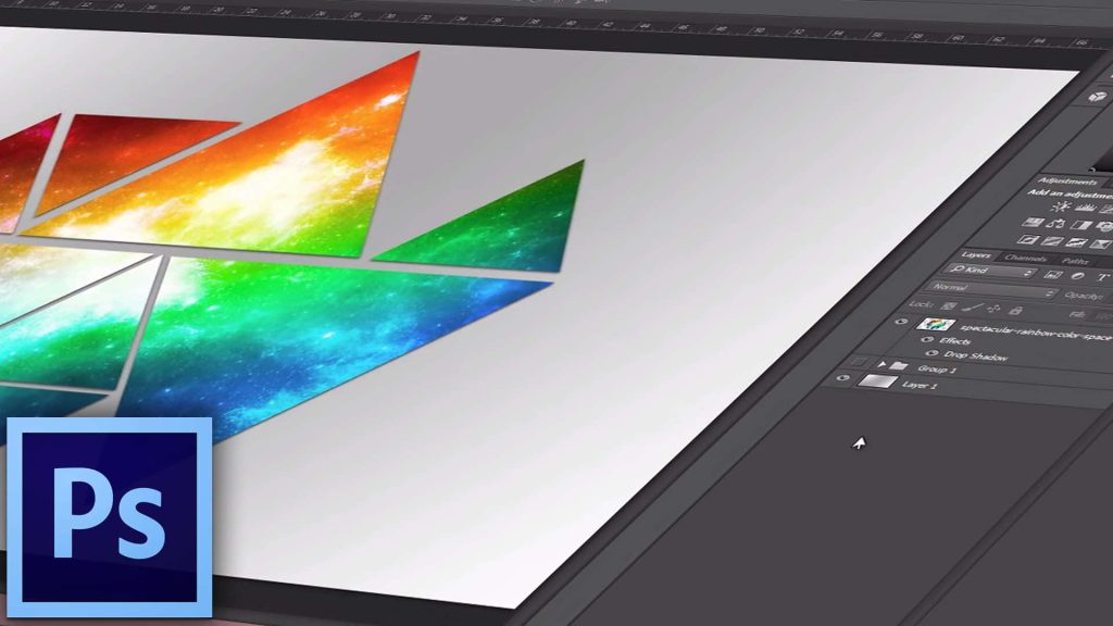 Adobe Photoshop wallpaper with rainbow nebula triangles and visible layers panel background