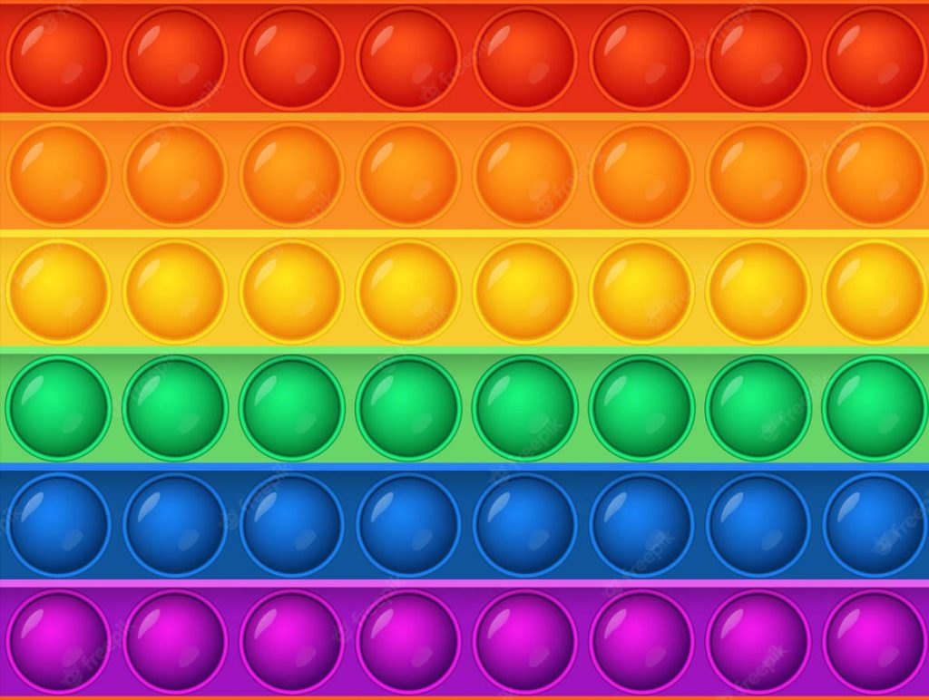 Vibrant rainbow Pop It digital art wallpaper with colorful spherical bubble poppers grid pattern