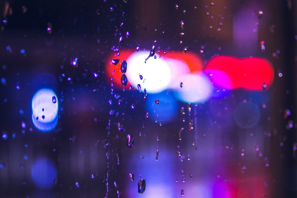 Vibrant Macro Raindrops Wallpaper with Colorful Bokeh Background