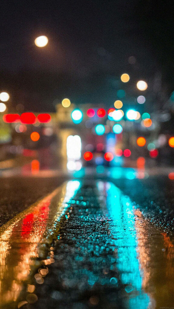 Vibrant Rainy Road: A Colorful iOS 16 Wallpaper Delight