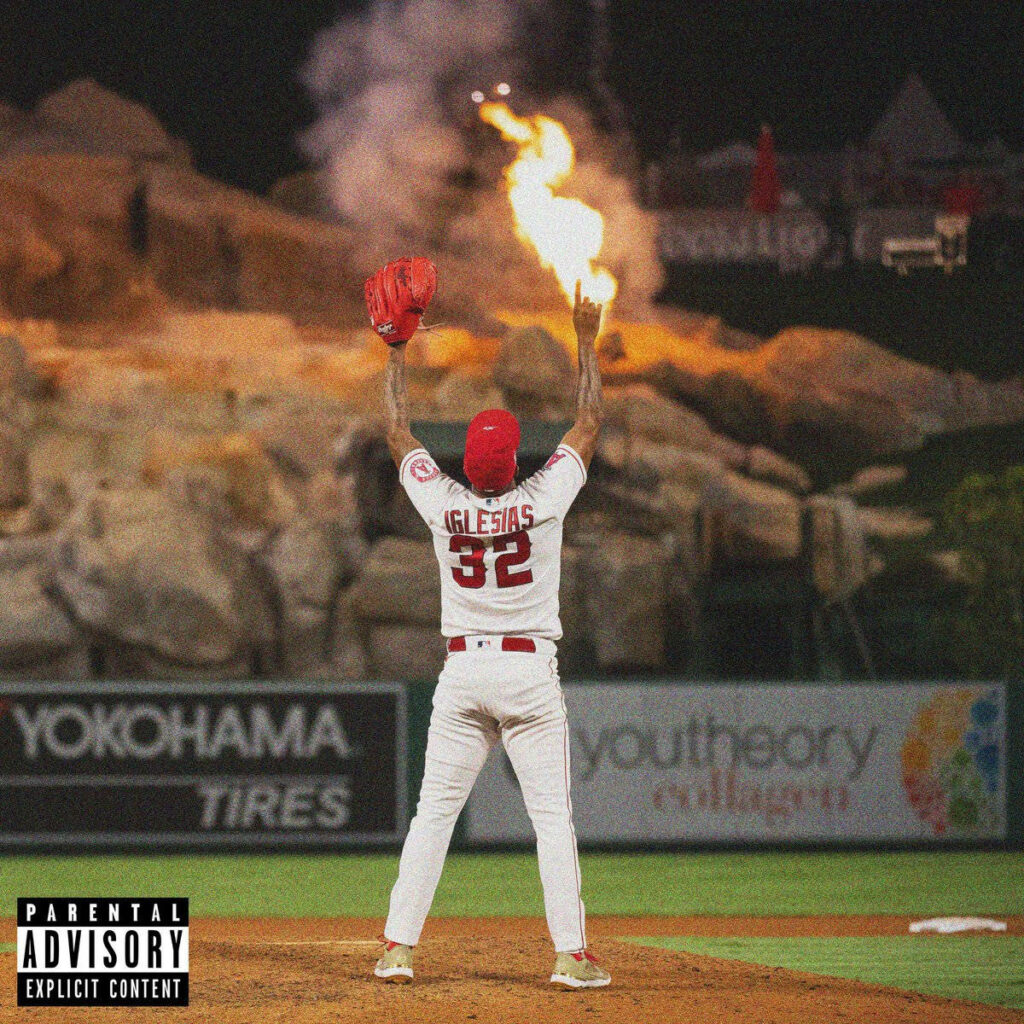 Vibrant Wallpaper of Raisel Iglesias Celebrating with Intense Flames
