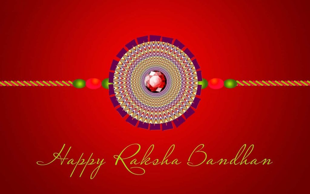 Vibrant Raksha Bandhan wallpaper with ornate gold purple red gemstone Rakhi on crimson background