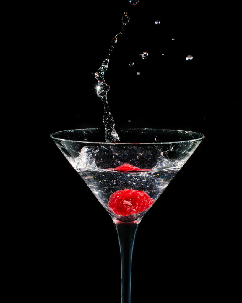 Elegant Raspberry Splash Wallpaper – Freshness in Dark Background