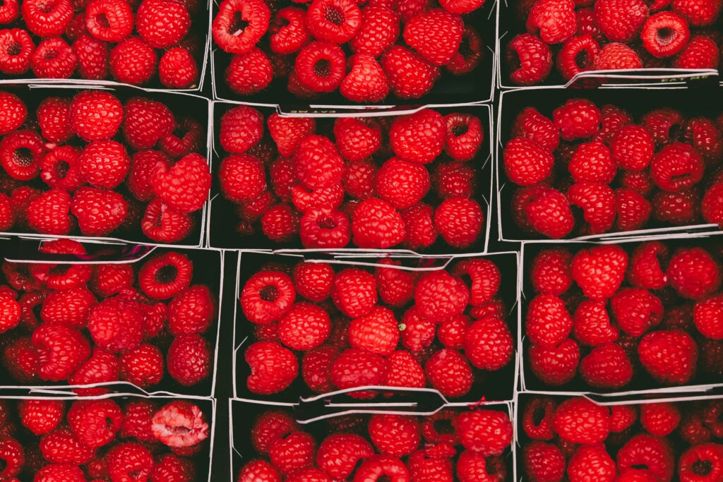 Vibrant Raspberry Wallpaper Background: Fresh Red Baskets of Fruit