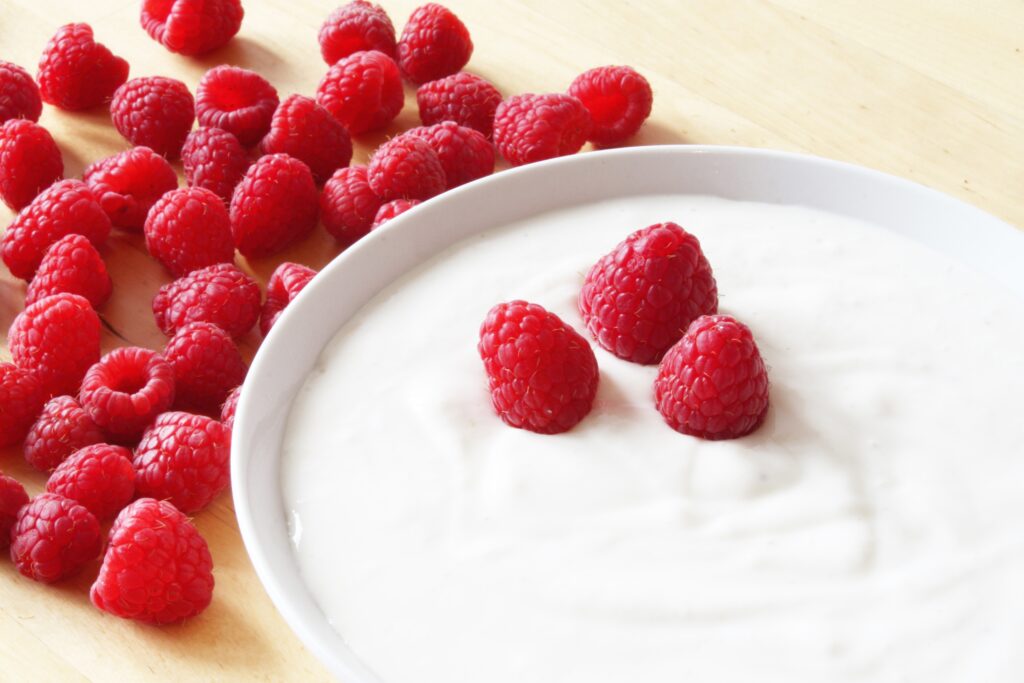 Vibrant Raspberry Wallpaper with Yogurt Scene - Wholesome Background