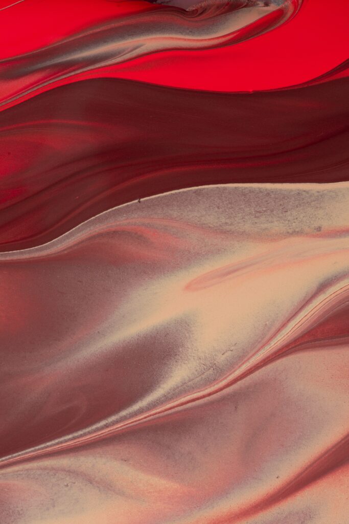 Dynamic Red Abstract Wallpaper: Liquid Swirls & Flowing Stripes