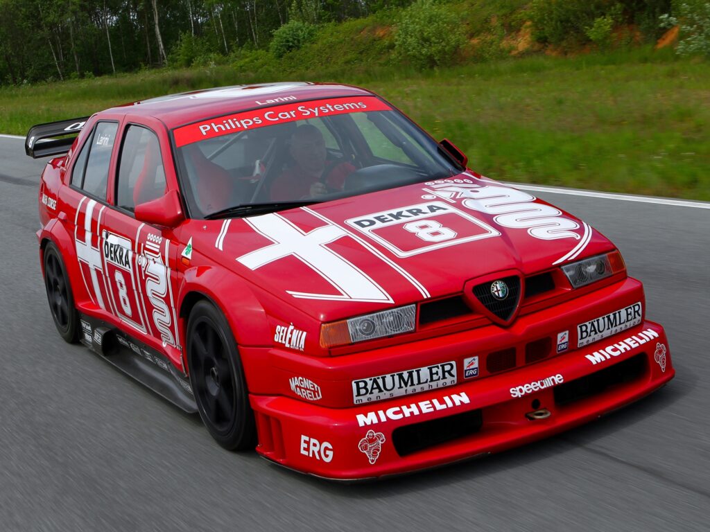 Vibrant Red Alfa Romeo 155: Sporty Front View with Racing Decals Wallpaper