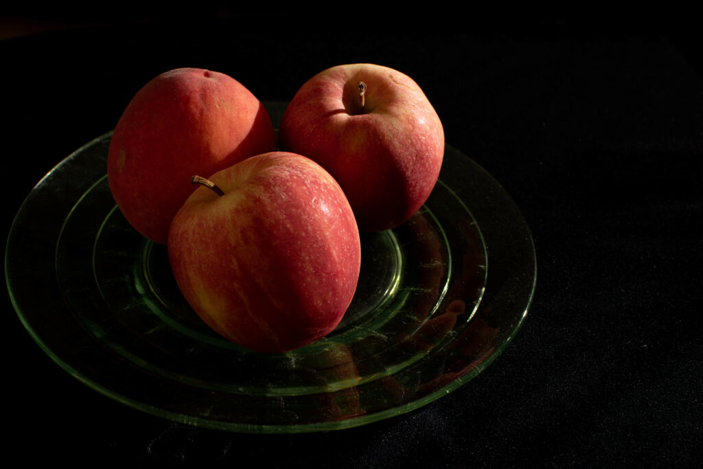 Vibrant Red Apples Wallpaper - Freshness on Glass Plate Background
