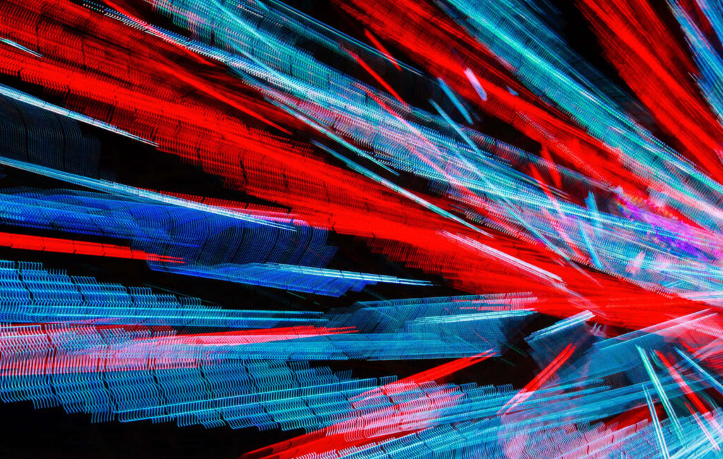 Dynamic Abstract Desktop Wallpaper: Vibrant Red, Blue & Cyan Explosion