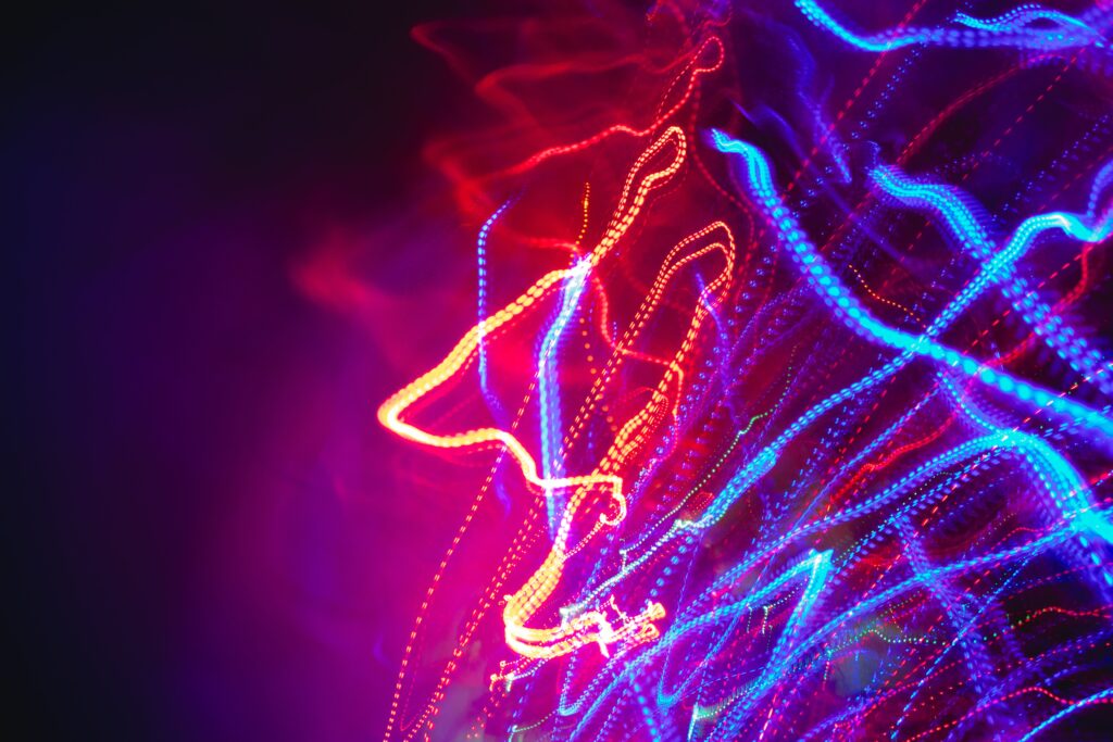 Vibrant Red and Blue Wavy Lines Abstract Background Wallpaper