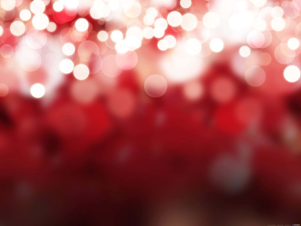 Vibrant red bokeh wallpaper with glowing white and pale red orbs on warm festive background