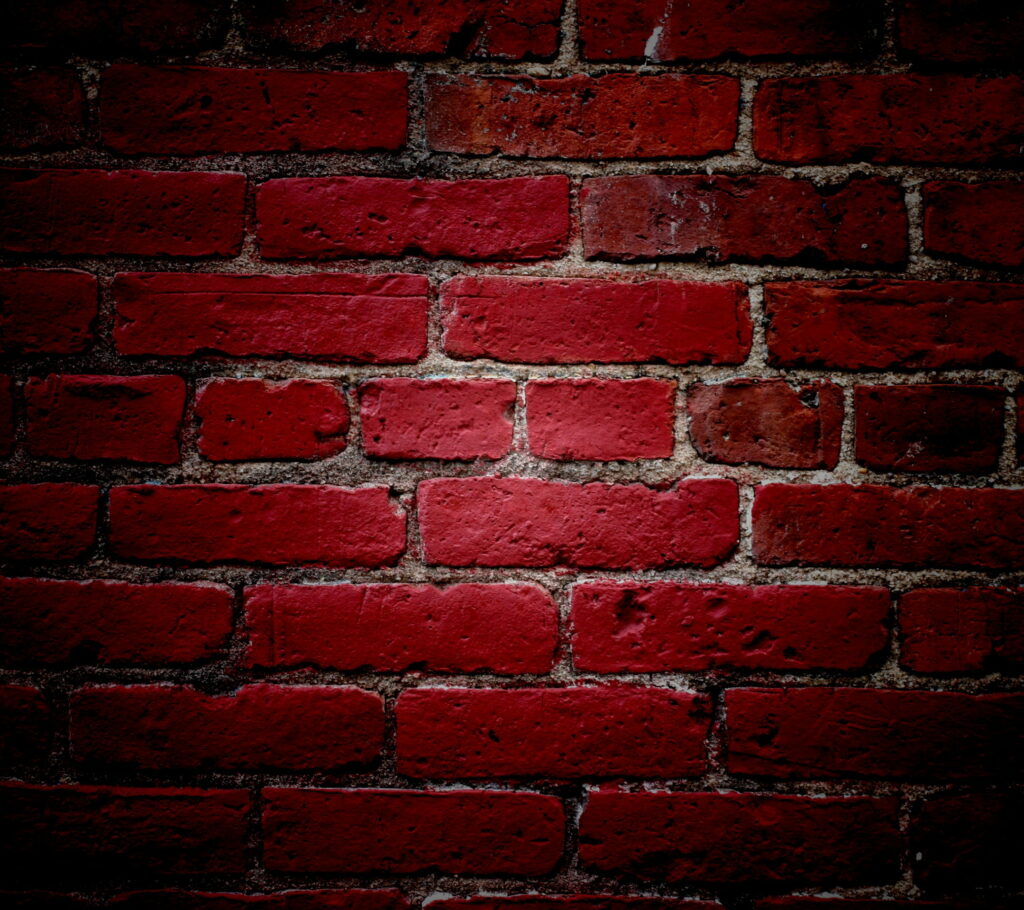 The Rustic Beauty of a Red Brick Wall: An HD Wallpaper Background