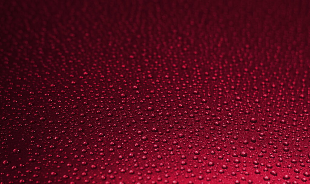 Vibrant Red Water Drops Texture Wallpaper