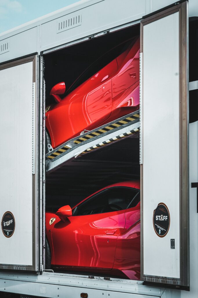 Vibrant Red Ferrari Sports Car: Luxury & Speed Wallpaper