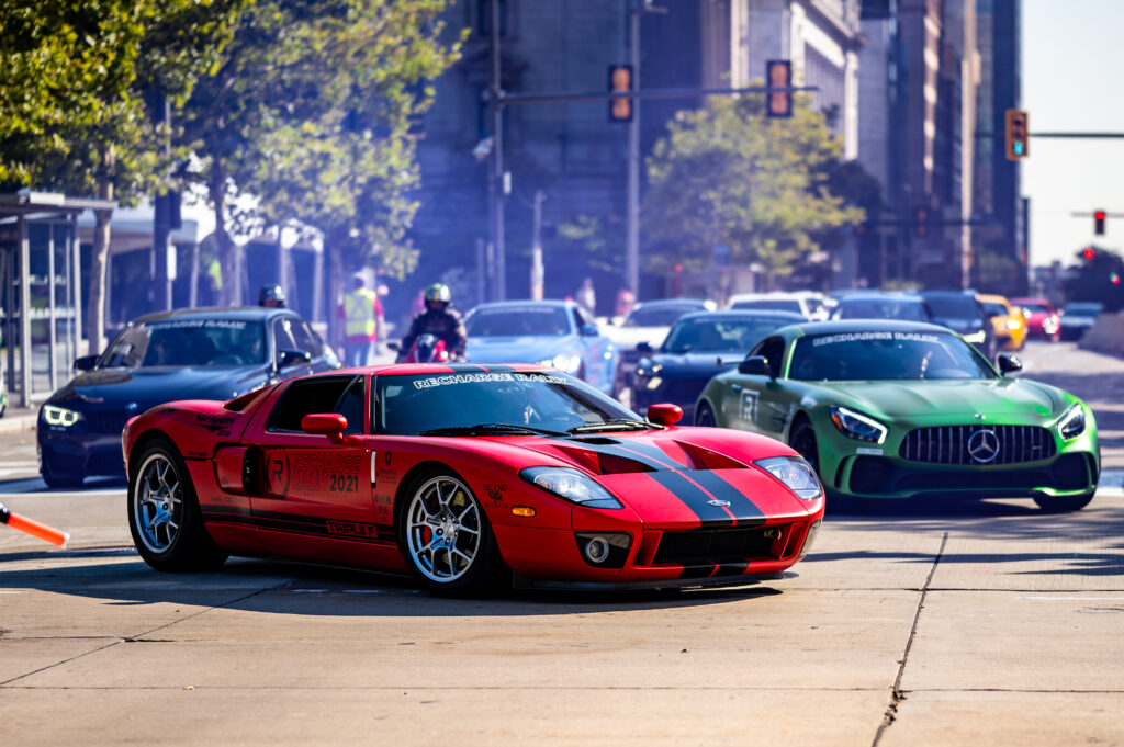 Vibrant Ford GT Sports Car Wallpaper on City Street - High-Res