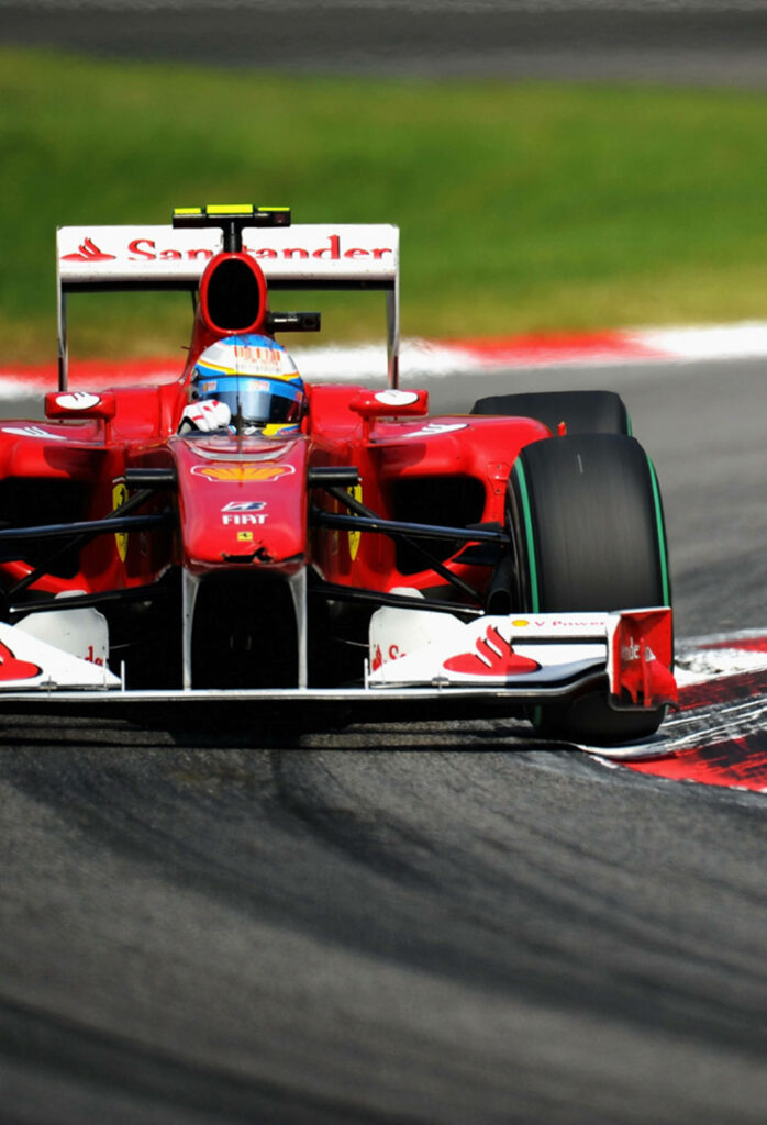 Vibrant Red Formula 1 Wallpaper: High-Speed Racing Art