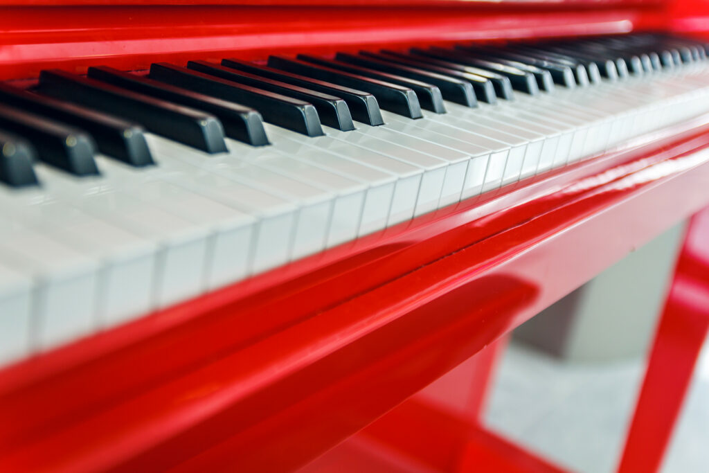 Stunning Macro Piano Keys Wallpaper in Bold Red Frame