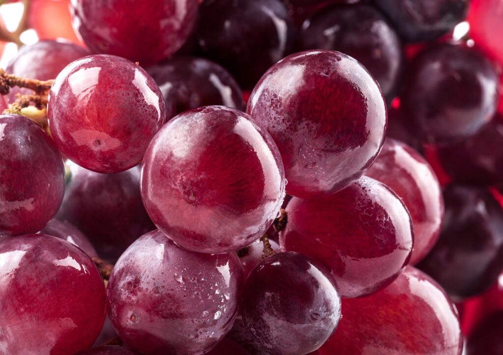Vibrant Close-Up of Juicy Red Grapes - Perfect Wallpaper Background