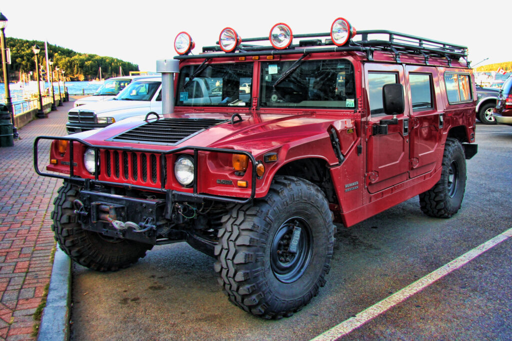 Red Hummer H1 Alpha by Scenic Waterfront: Rugged Off-Road Beauty Wallpaper