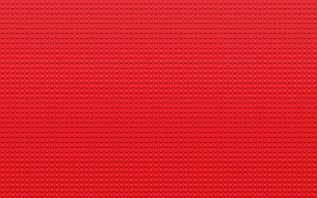 HD red Lego brick texture wallpaper with vibrant background for creative design inspiration