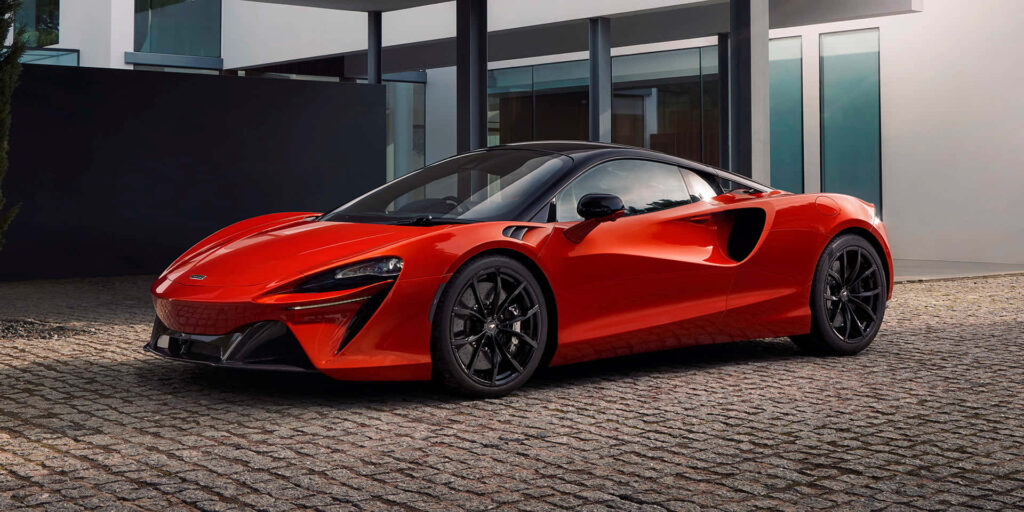 Vibrant Red McLaren Elegance: Luxury Wallpaper Background