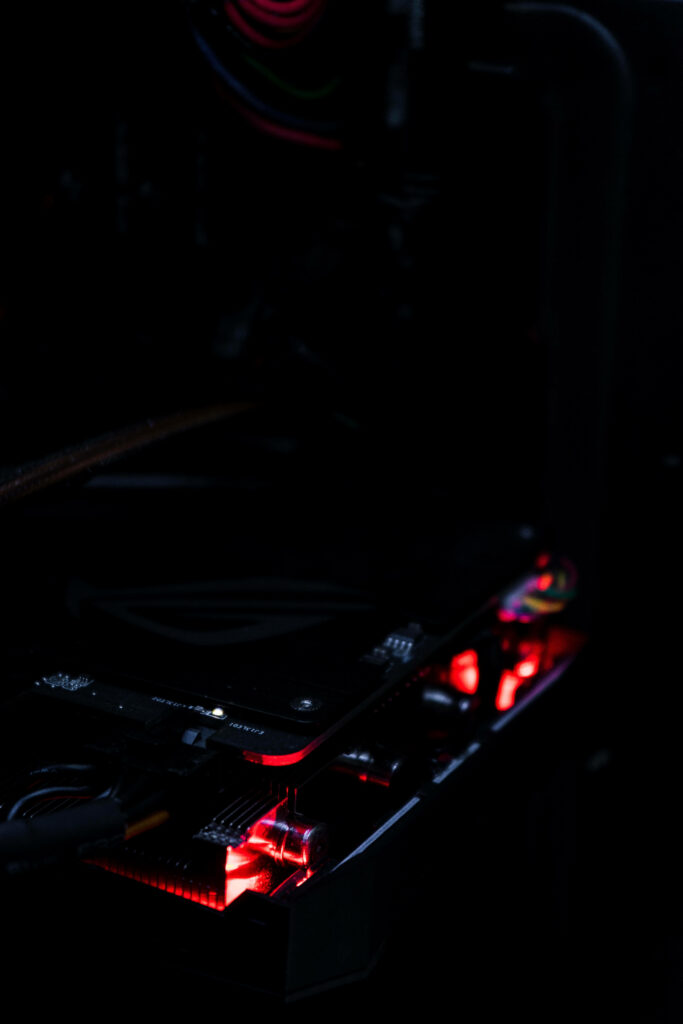 Dark NVIDIA ROG GPU Wallpaper with Vibrant Red Lighting Design