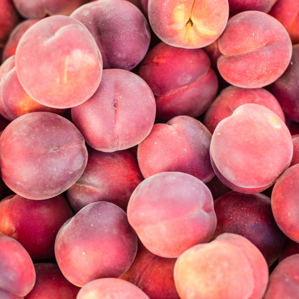 Vibrant Red Peach Wallpaper: Fresh, Colorful Background Display