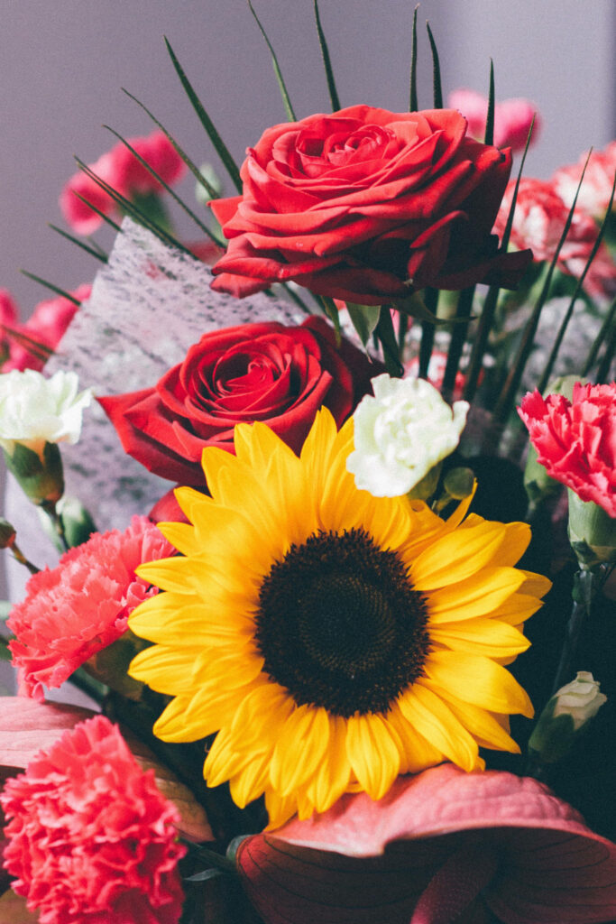 Vibrant Red Roses & Yellow Sunflower Wallpaper for Cheerful Interiors