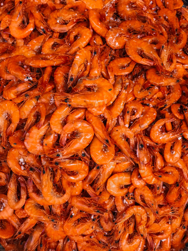 Vibrant Wallpaper of Freshly Cooked Red Shiny Shrimp - Rich Texture